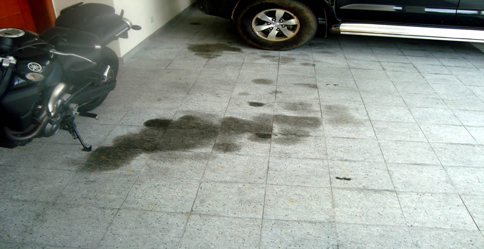Como limpiar manchas de aceite del piso
